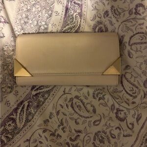 Elegant Cream Clutch with Gold Accents